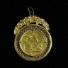 Medalha em Ouro com Libra