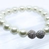 Pulseira elástica com perolas